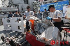 亚航失事航班寻获39具遗体 机身黑匣仍下落不明